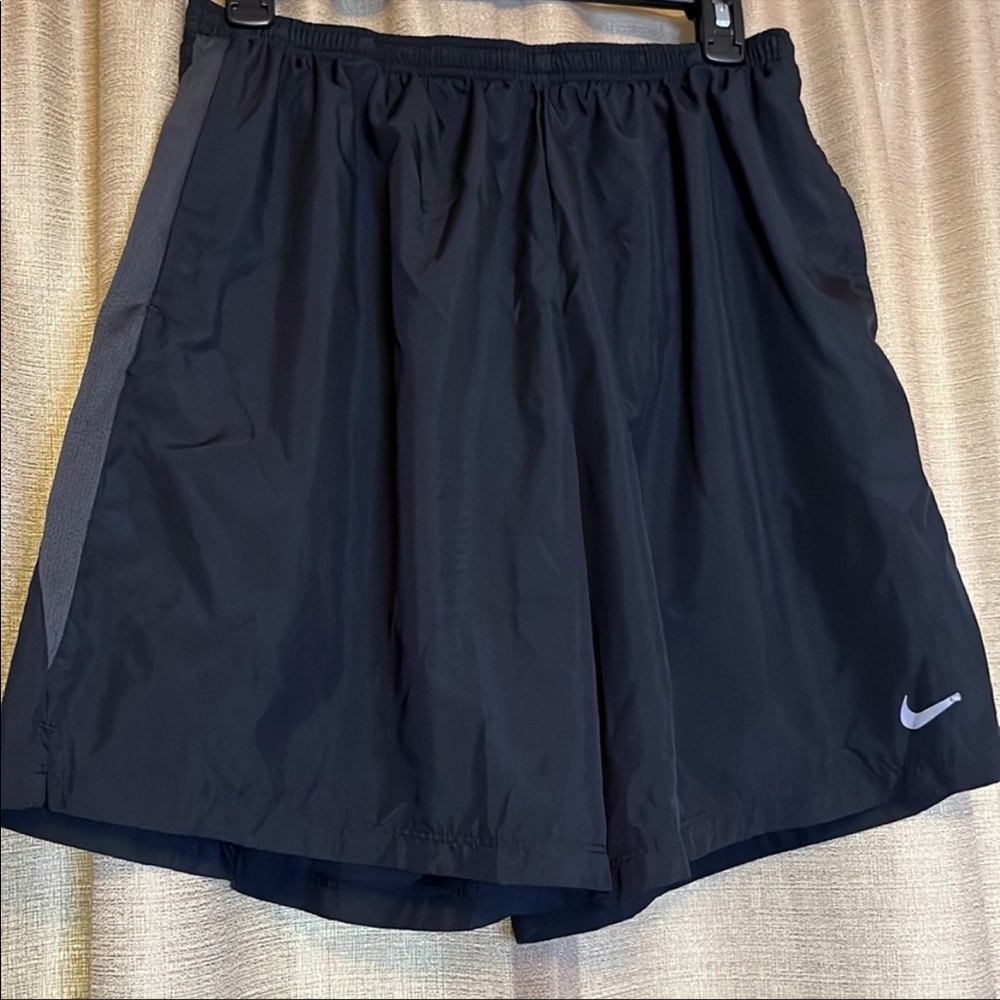 Nike dri-fit running shorts. Black w/inside liner, drawstring & pockets